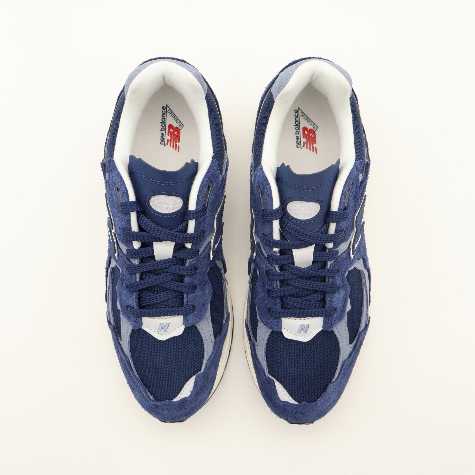 M2002RDK New Balance 2002R Protection Pack Navy Blue Grey White Sail Beige