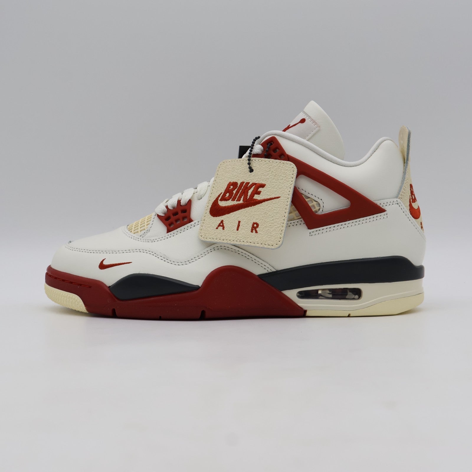 IQ8055-100 Nigel Sylvester Ã Nike Air Jordan 4 "Brick After Brick" (Men's)