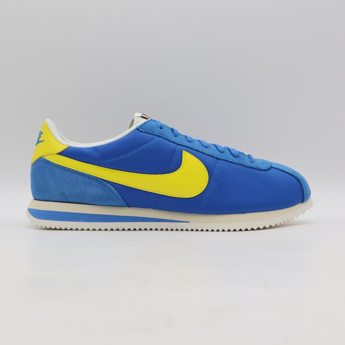 HF0263-402 Nike Cortez TXT Blue Yellow (Men's)