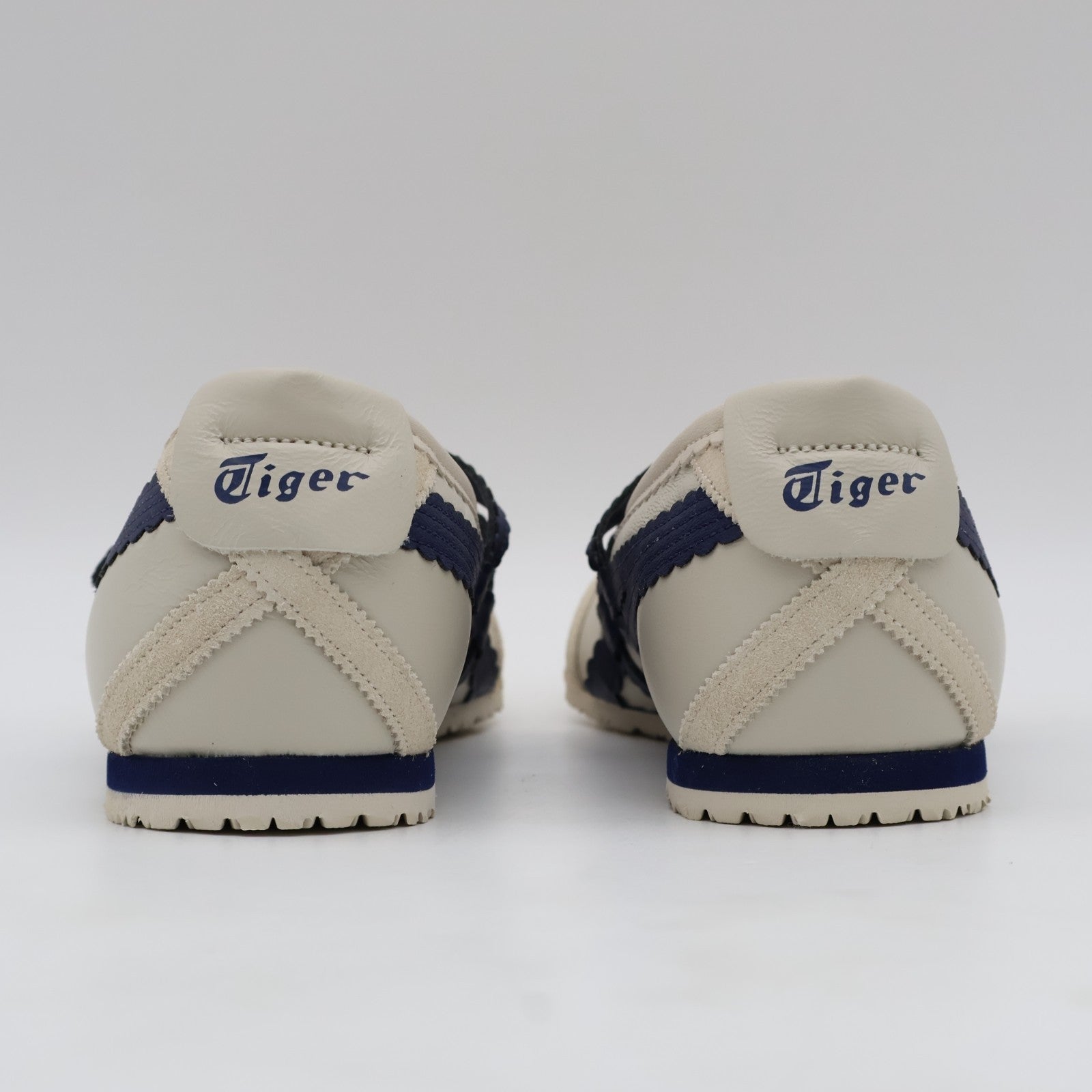 1182A678-200 Onitsuka Tiger Mexico 66 TGRS Birch Peacoat (Women's)