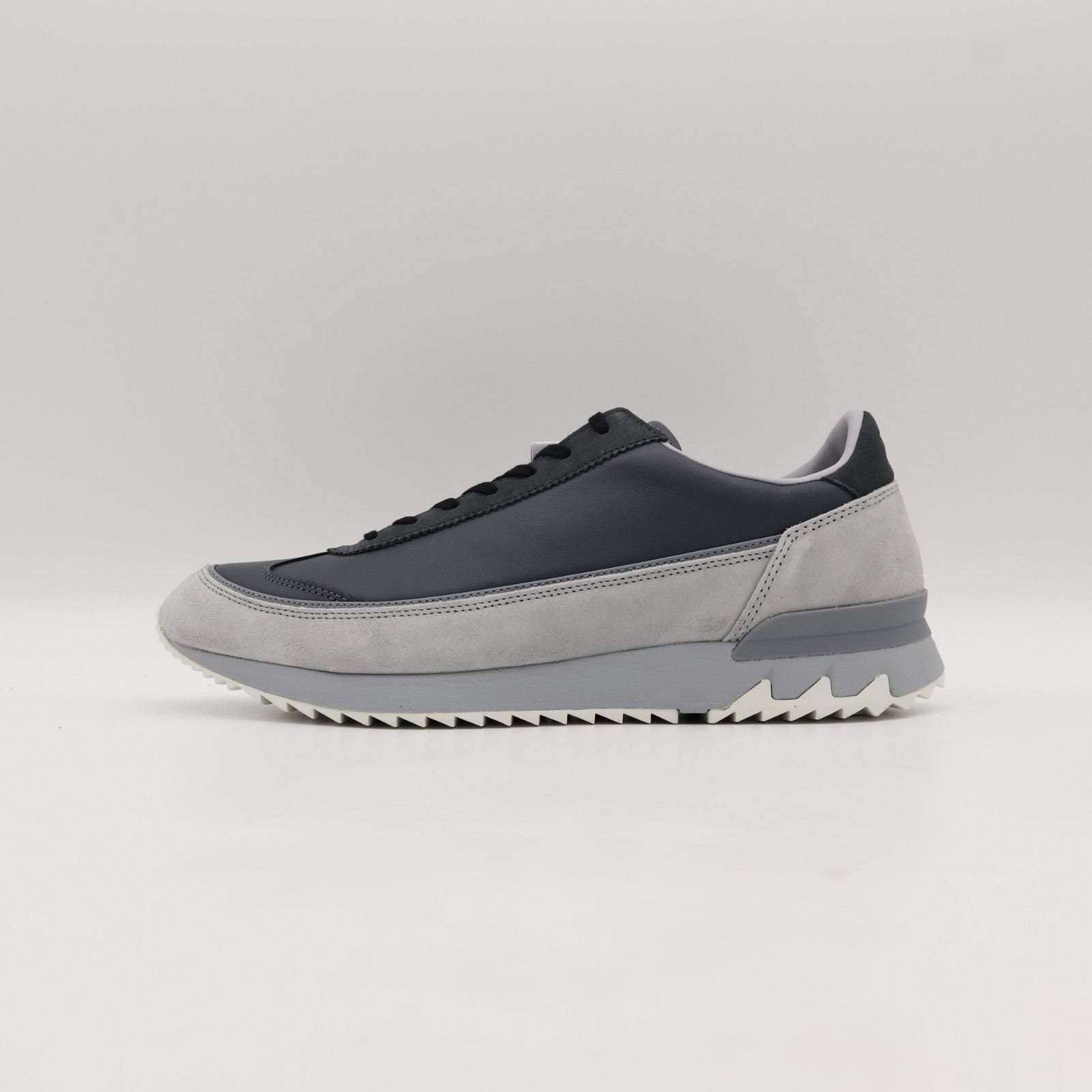1183C385-021  Onitsuka Tiger Hsinti Carrier Grey (Men's)
