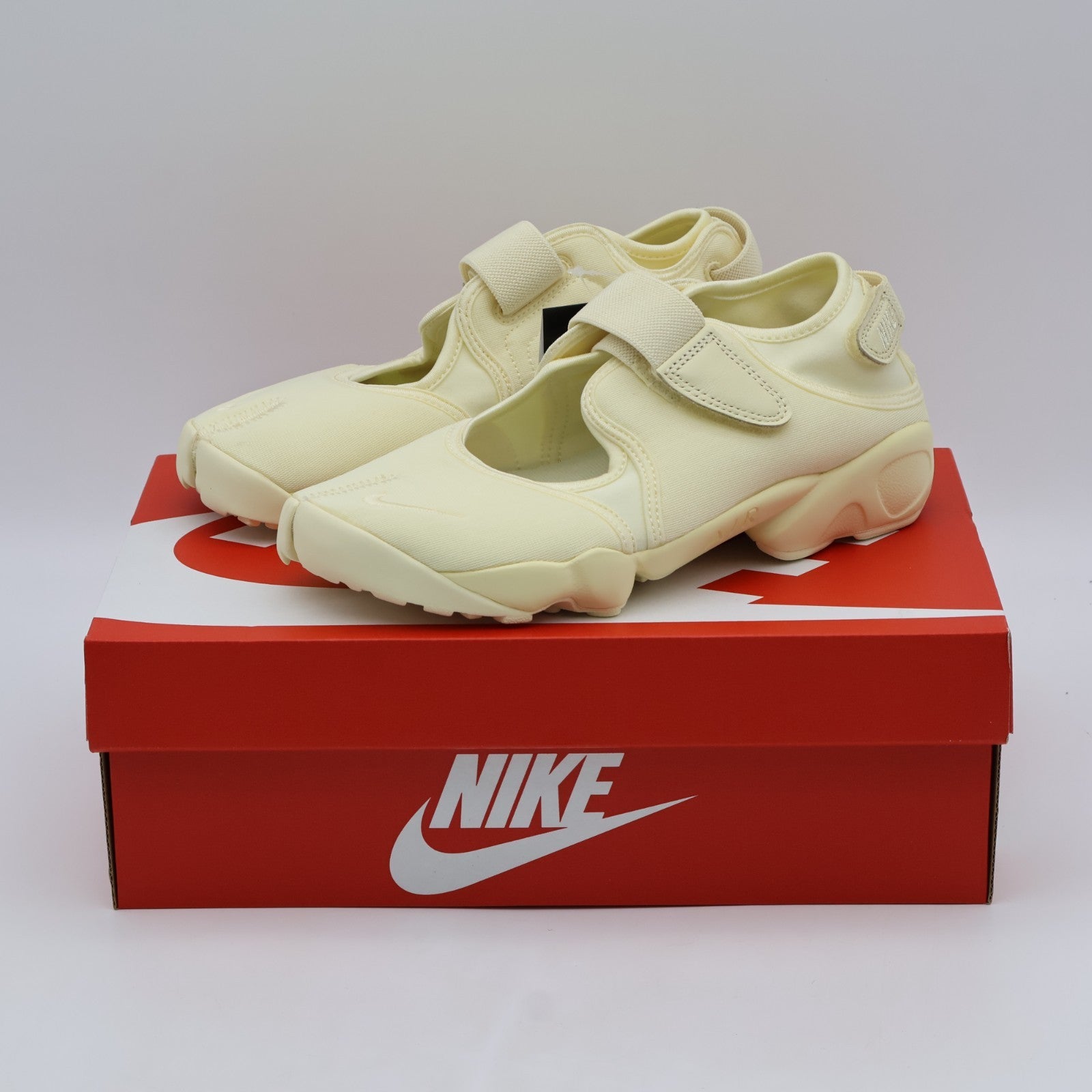 IV6058-700 Nike Air Rift Neo "Sunbleach" (Women's)