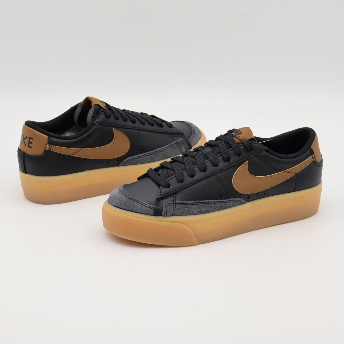 DJ0292-003 Nike Blazer Low Platform Black White Gum Yellow (Women's)