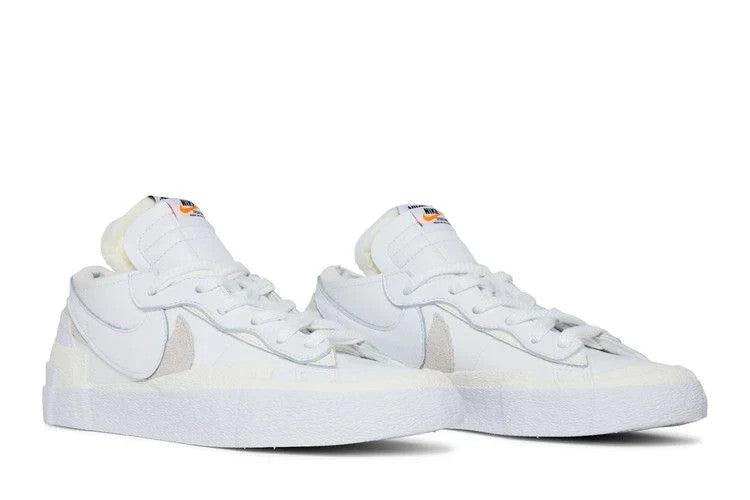 DM6443-100 sacai Ã Nike Blazer Low "White Patent Leather" (Men's)