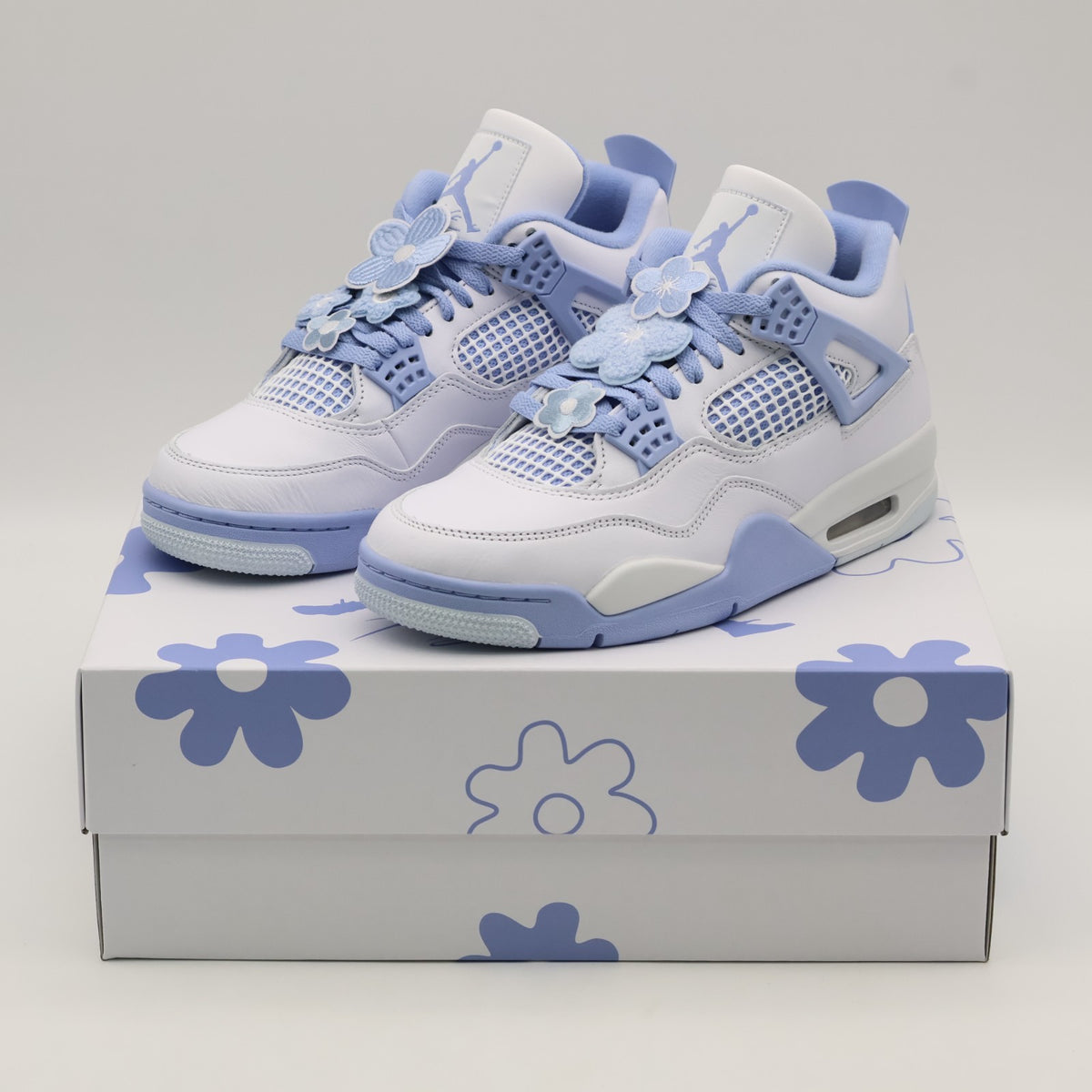 HV0823-100 Nike  Air Jordan 4 Retro Forget Me Not (Women's)