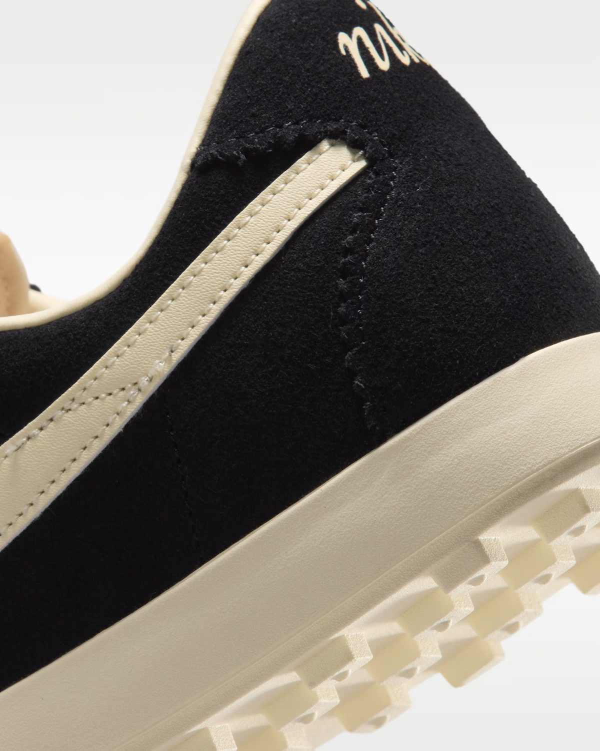 IQ7611-001 Nike Astrograbber Suede "Black/Muslin" (Women's)