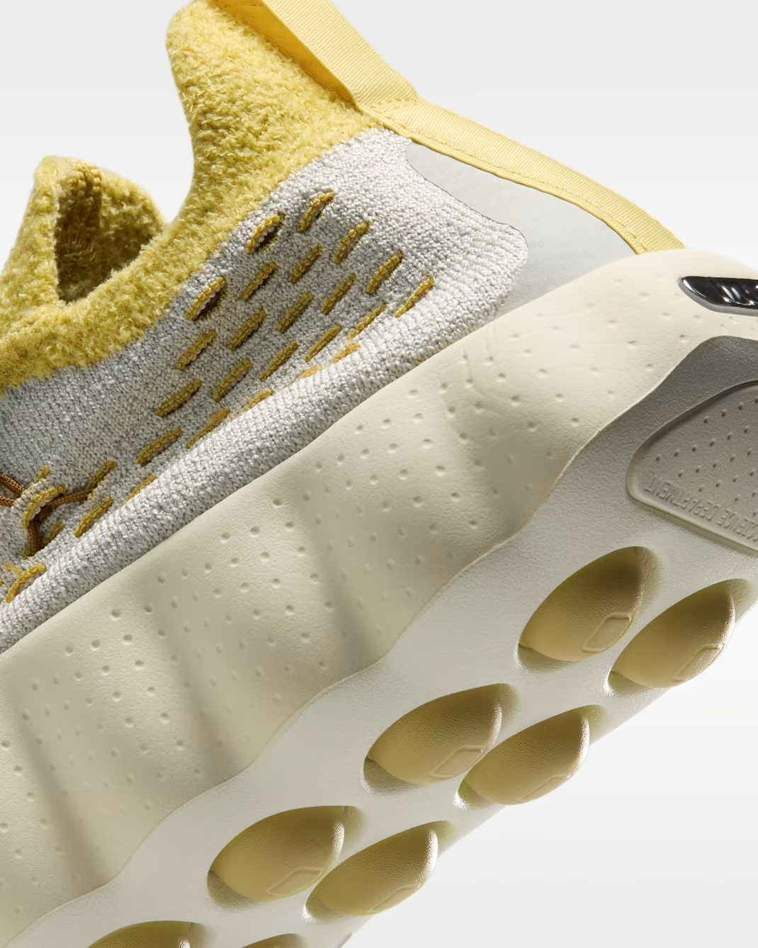 IR2176-003 Nike Mind 002 Flyknit "Light Bone/Saturn Gold" (Men's)