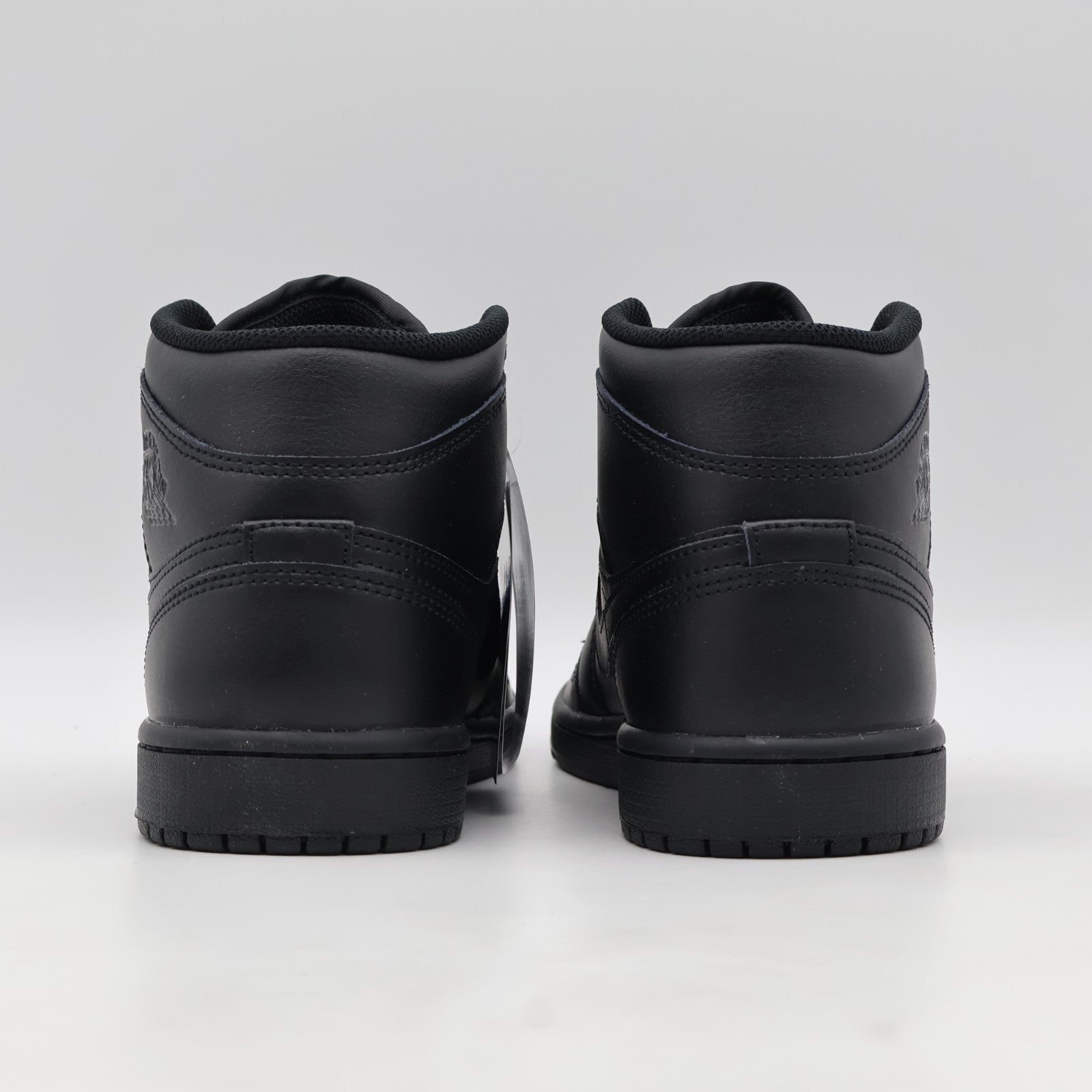 554724-093 Nike Air Jordan 1 Mid Triple Black (Men's)