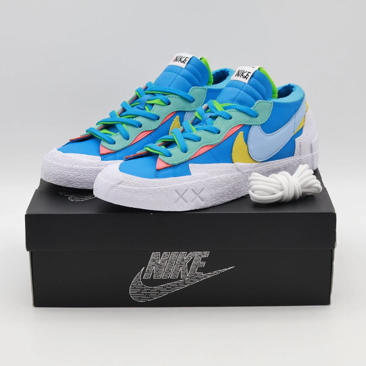Size 7 - DM7901-400 KAWS x sacai x Nike Blazer Low Neptune Blue (Men's)