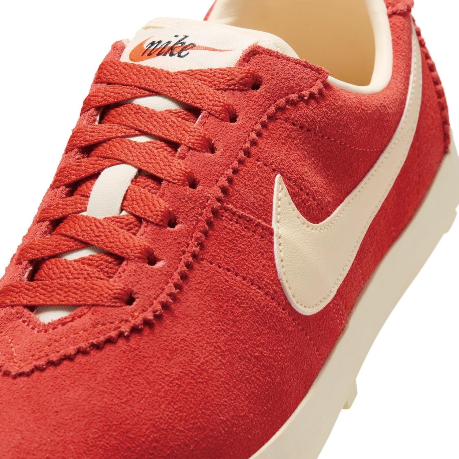 IQ7611-601 Nike Astrograbber Suede "Light Crimson/Muslin" (Women's)