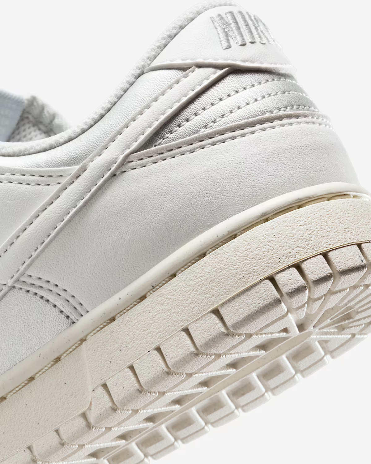 IB7311-001 Nike  Dunk Low Next Nature Metallic Platinum (Women's)