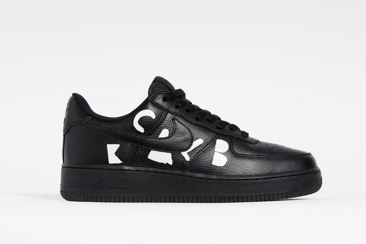 IB9949-001 BLACK COMME des GARÃONS Ã Nike Air Force 1 Low Retro Black (Men's)