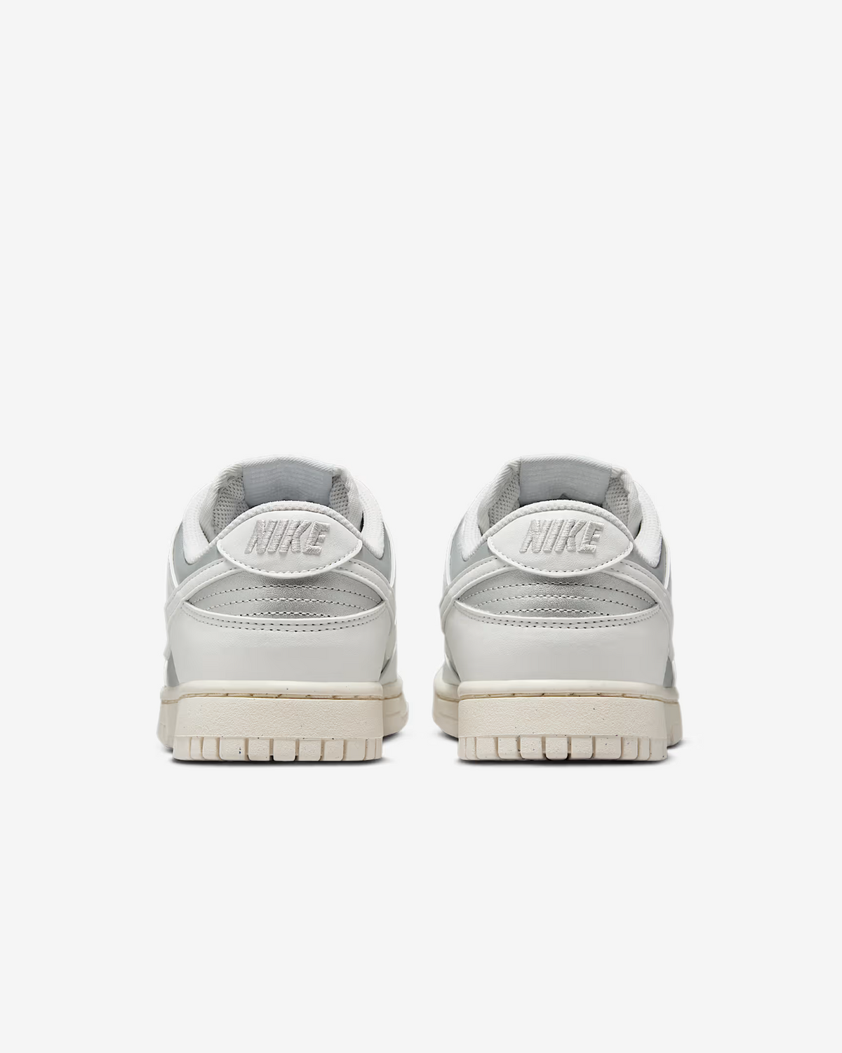 IB7311-001 Nike  Dunk Low Next Nature Metallic Platinum (Women's)