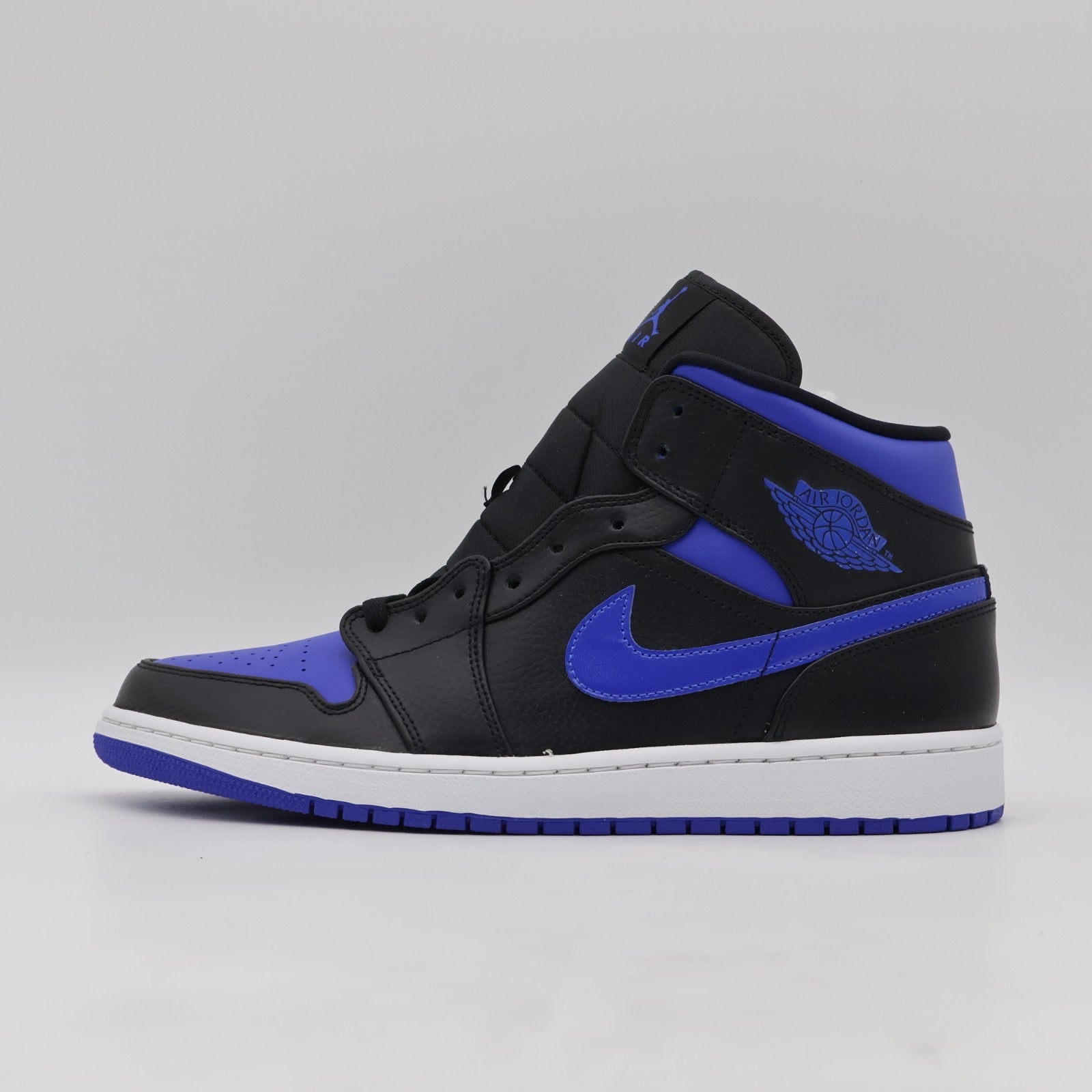 554724-068 NIKE AIR JORDAN 1 MID BLACK BLUE (Men's)