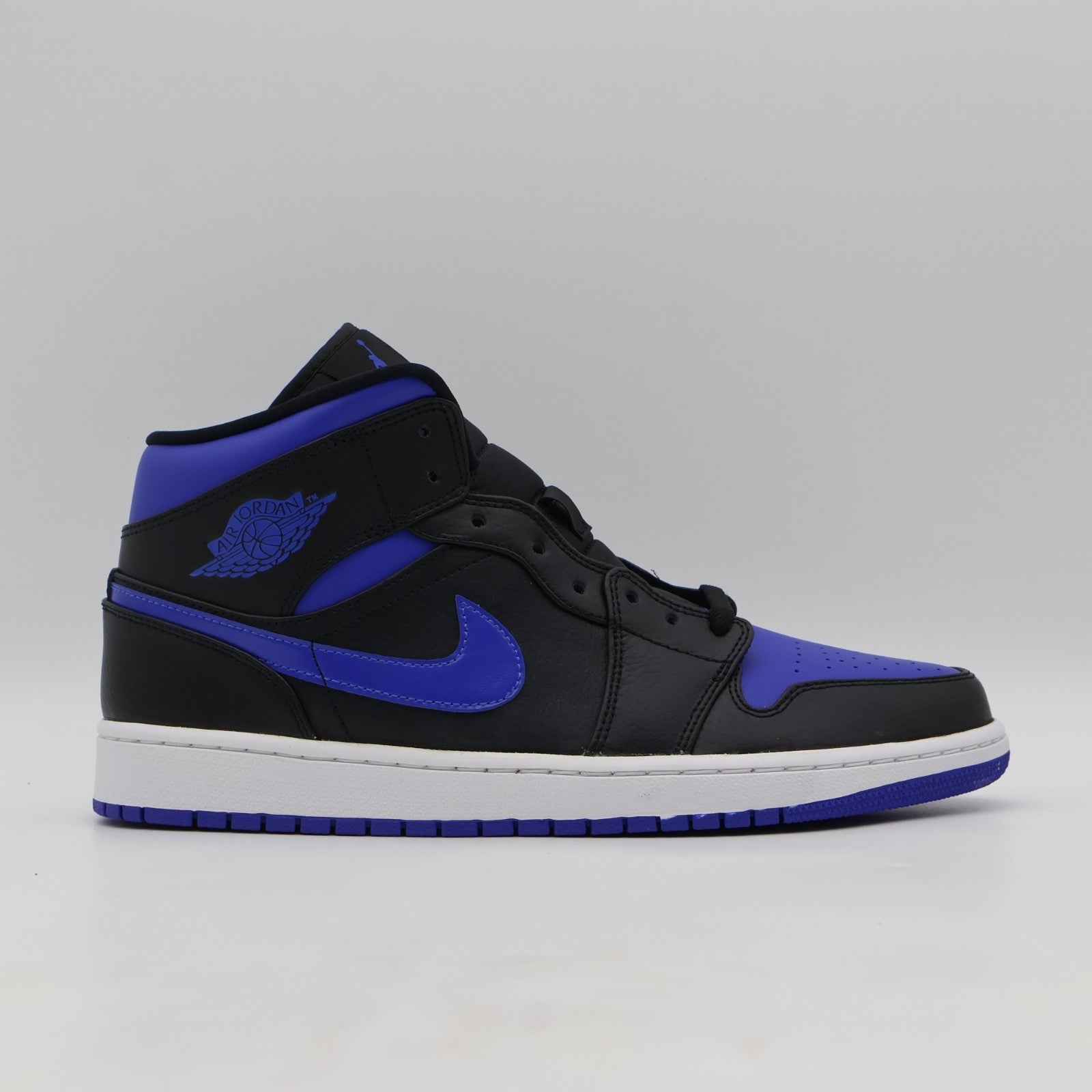 554724-068 NIKE AIR JORDAN 1 MID BLACK BLUE (Men's)