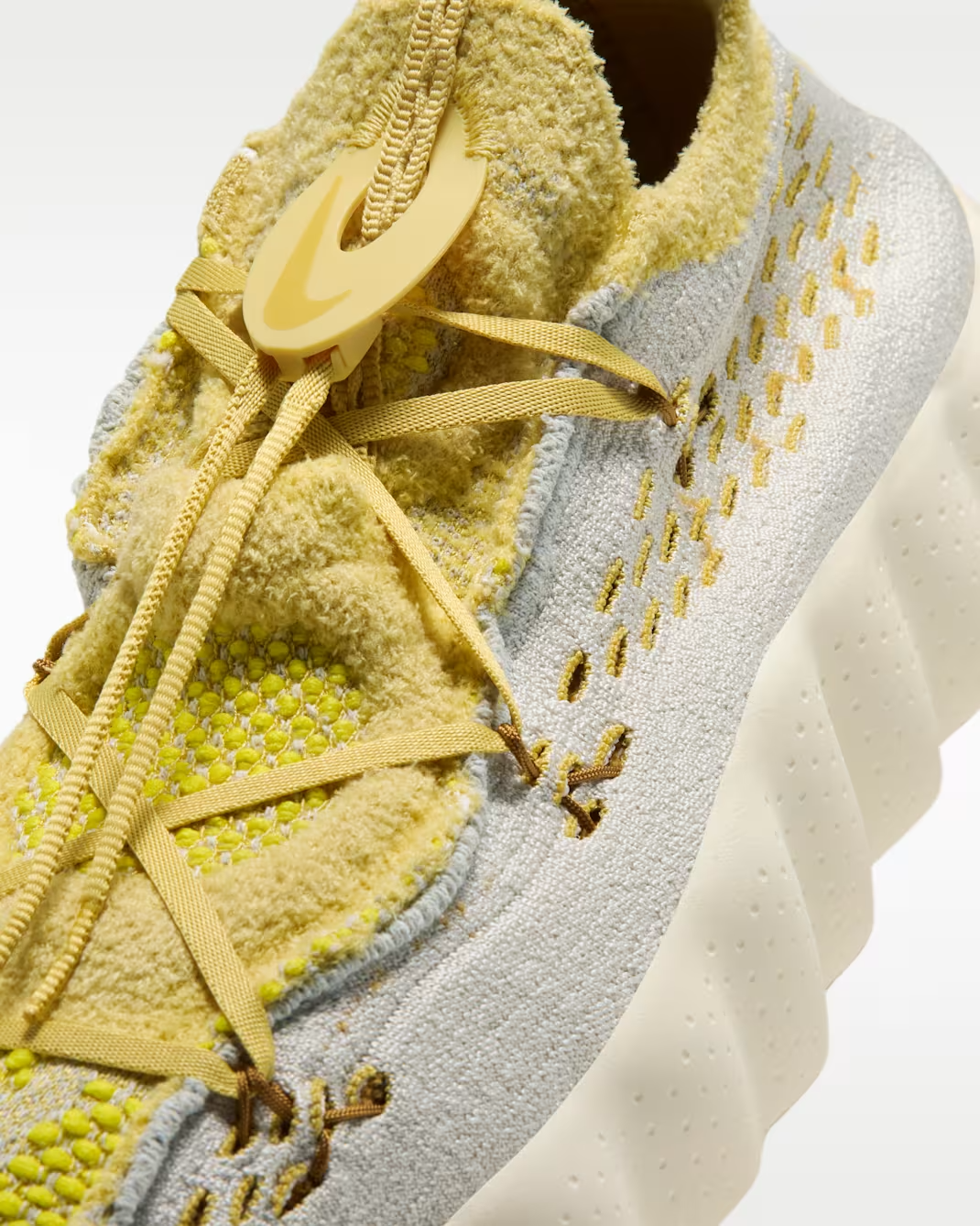 IR2176-003 Nike Mind 002 Flyknit "Light Bone/Saturn Gold" (Men's)