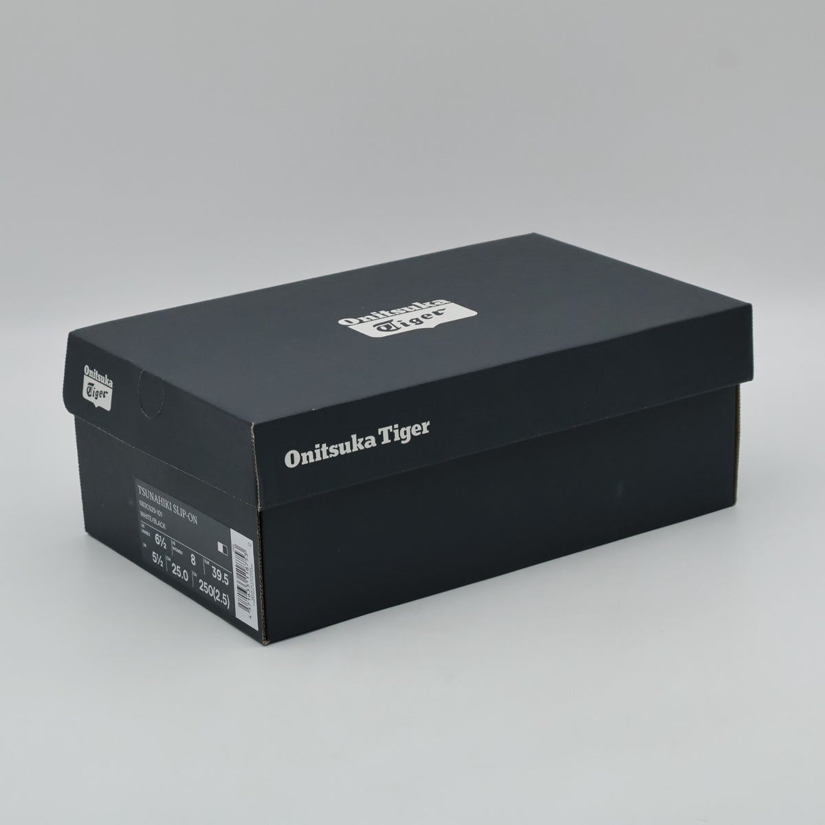 1183C529-101 Onitsuka Tiger Tsunahiki Slip On White Black (Men's)