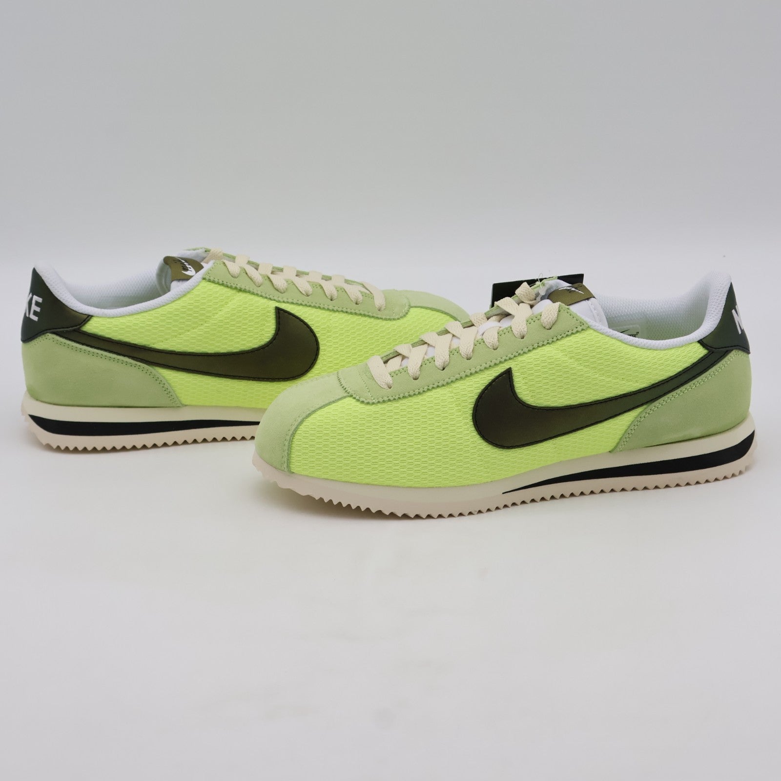 IB8135-736 NIKE CORTEZ TXT LT LEMON TWIST/BLACK-COCONUT MILK-WHITE (Men's)