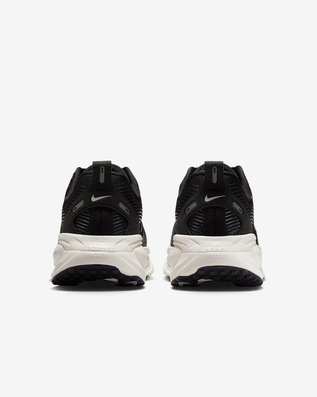 IF0515-002 Nike Vomero 18 Black Coconut Milk Light Iron Ore  (Women's)