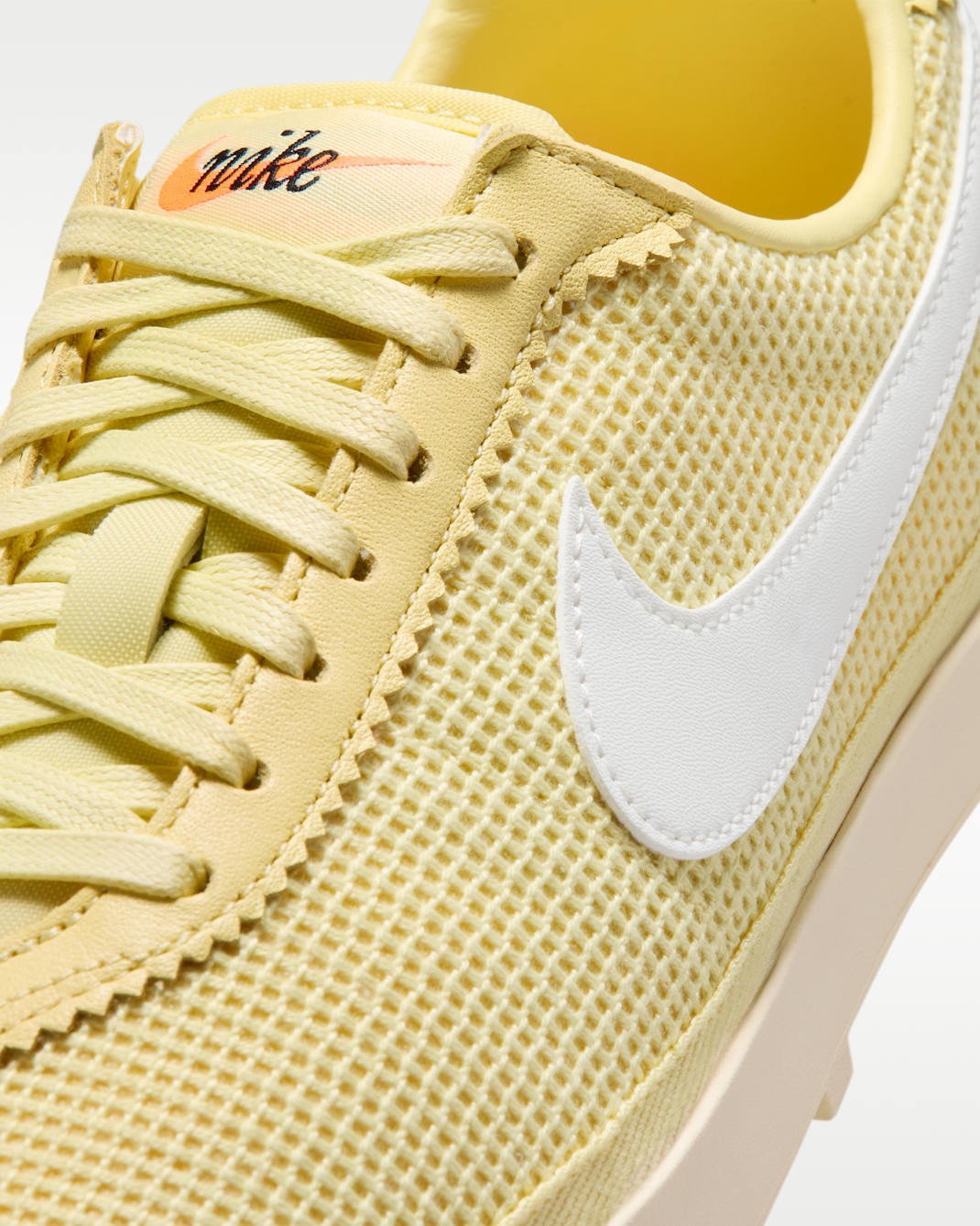 II1248-700 Nike Women's Astrograbber Textile Soft YellowMuslin (Women's)