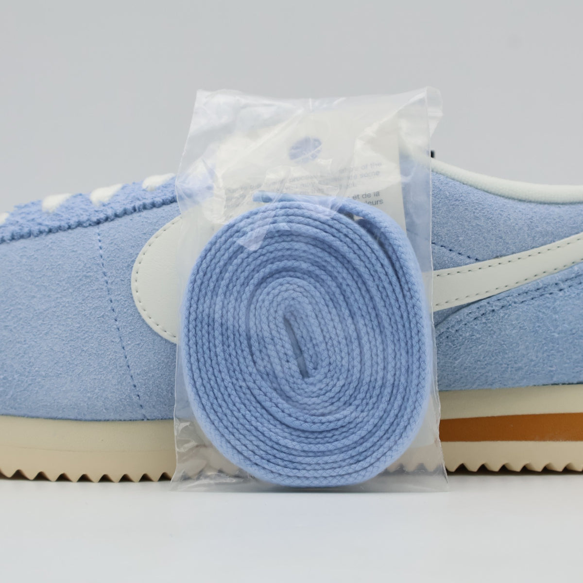 HF3142-400 Nike Cortez SE Suede Psychic Blue Monarch Muslin Sail (Men's)