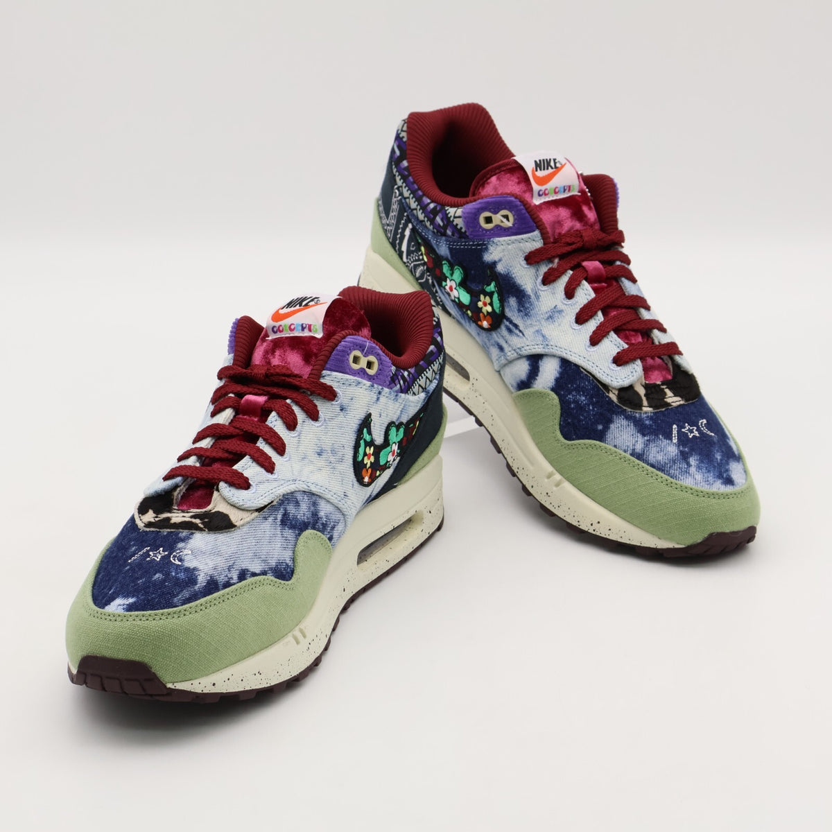 DN1803-300 Concepts Nike Air Max 1 Mellow Oil Green Black Team Red Sail (Men's)