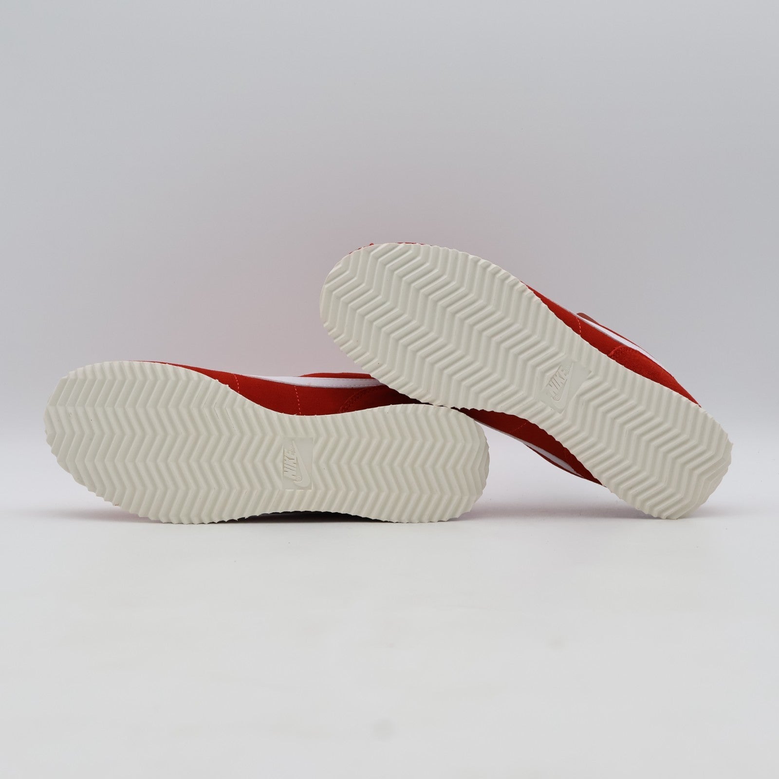 IB1857-600 Nike Cortez Light Crimson (Women's)