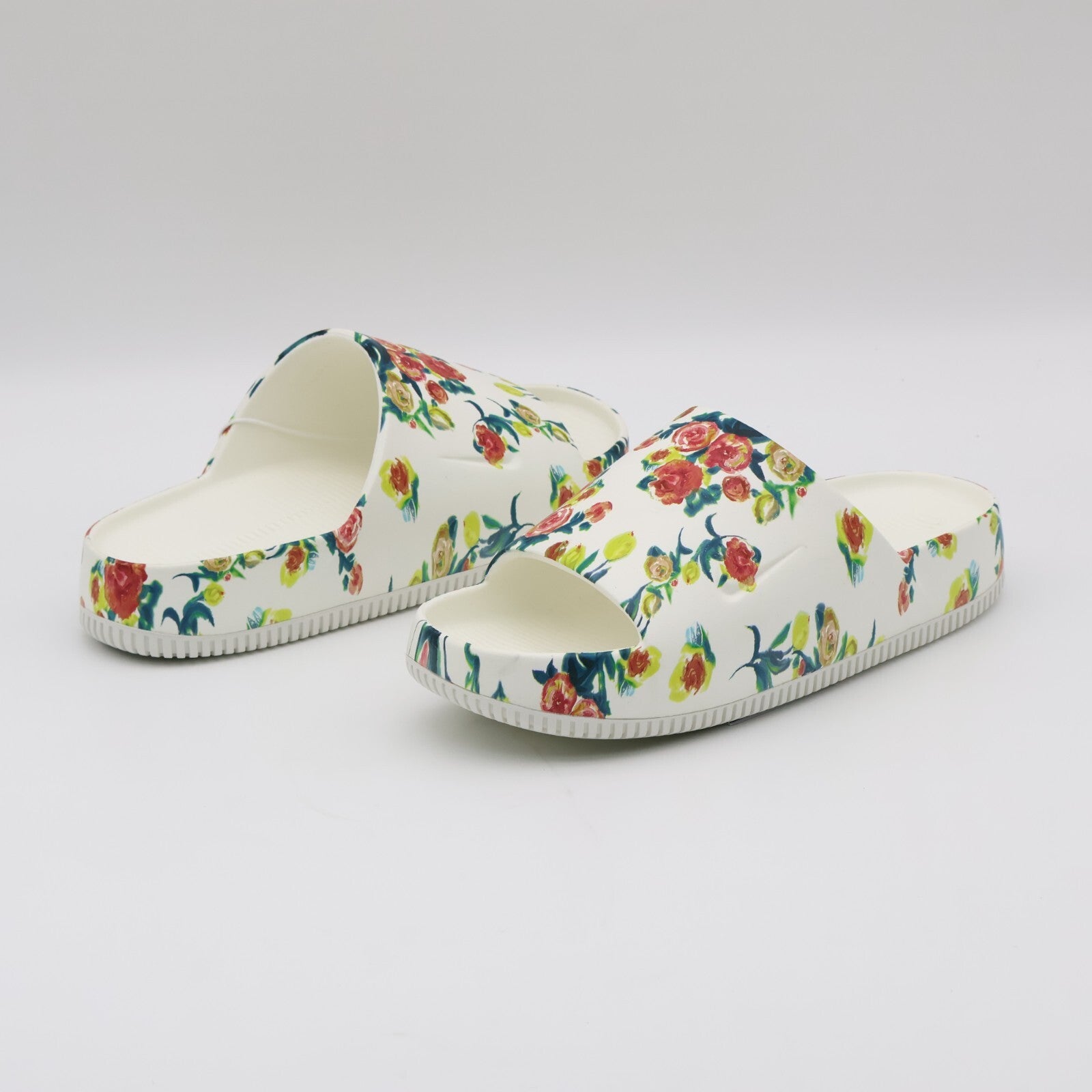 HF1069-100 Nike Calm Slide Floral Sail (Women's)