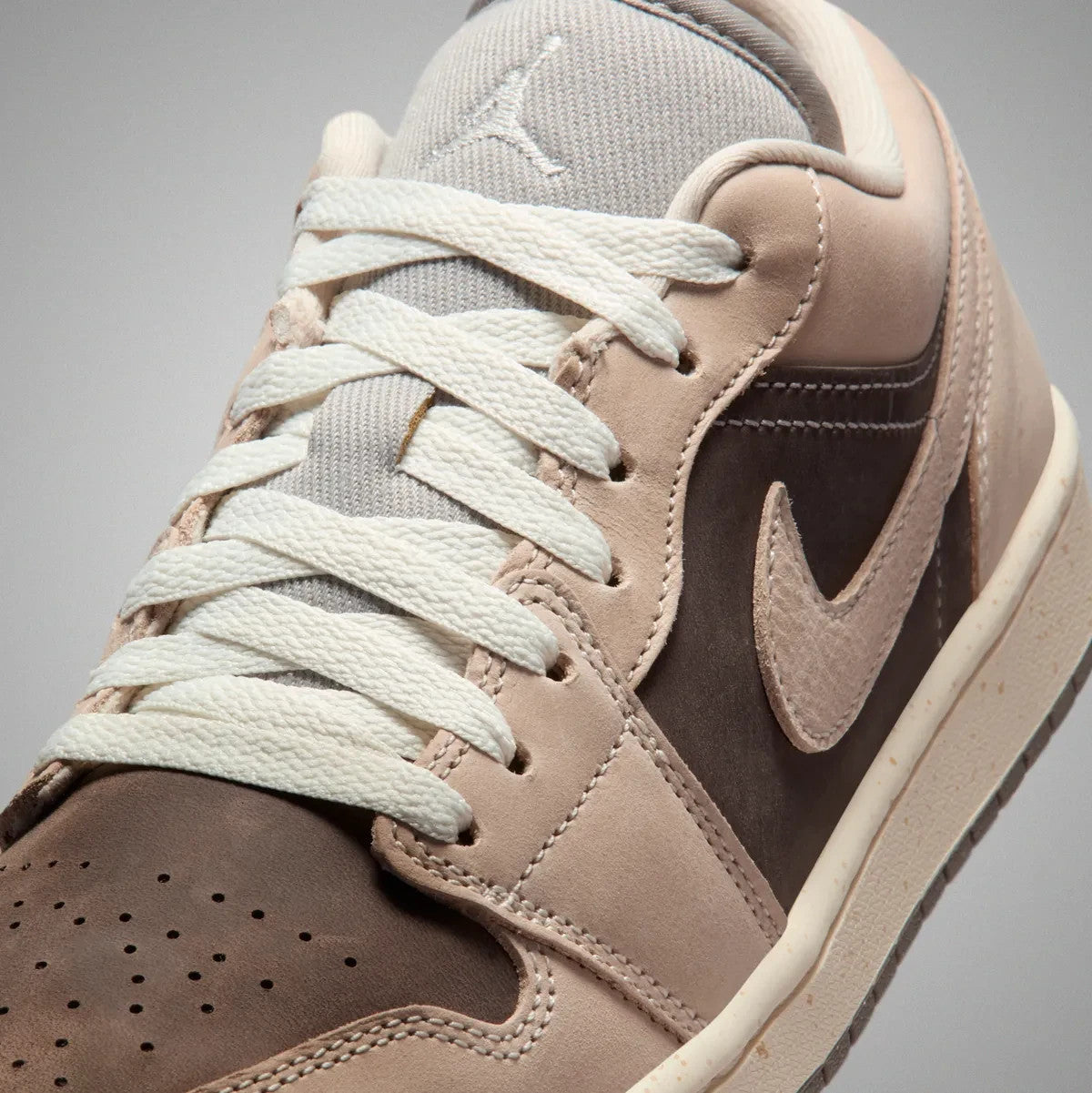 IB7011-001 Nike Air Jordan 1 Low Enigma Stone (Women's)