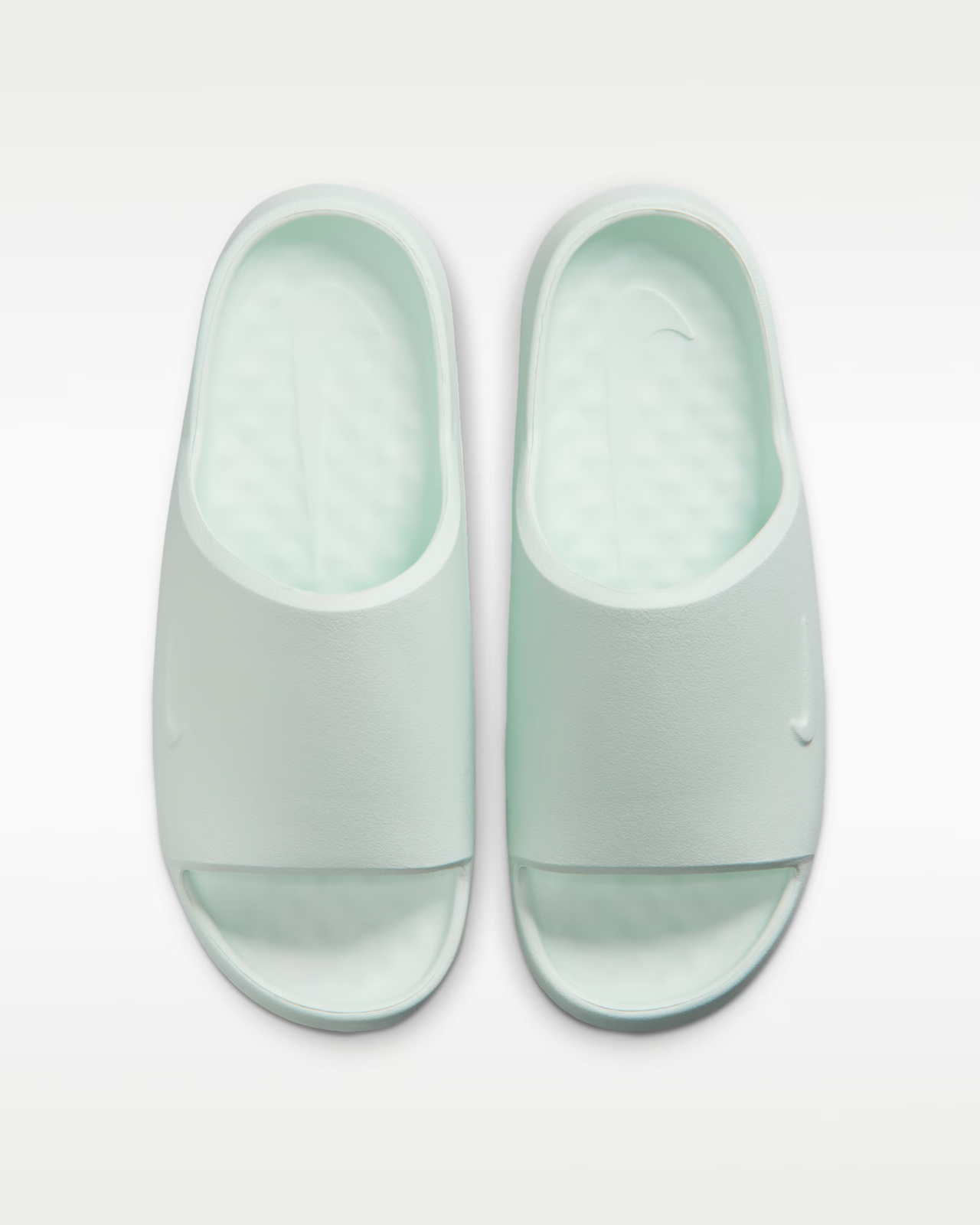 IB7561-300 Nike Calm 2.0 Slide "Barely Green" (Women's)