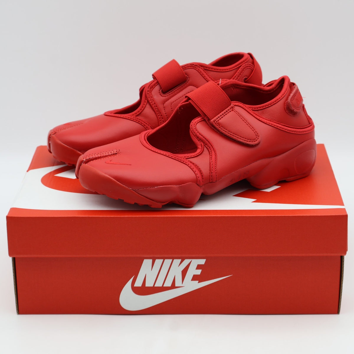 HM5737-600 Nike Air Rift Leather Fire Red (Women's)