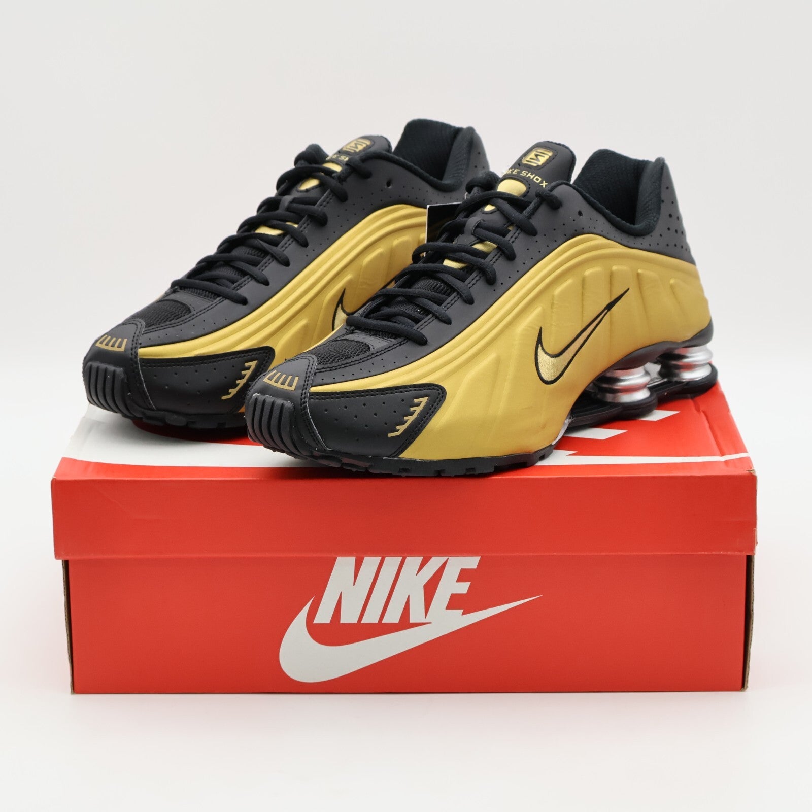 AR3565-005 Nike Shox R4 Black Metallic Gold Silver (Women's)