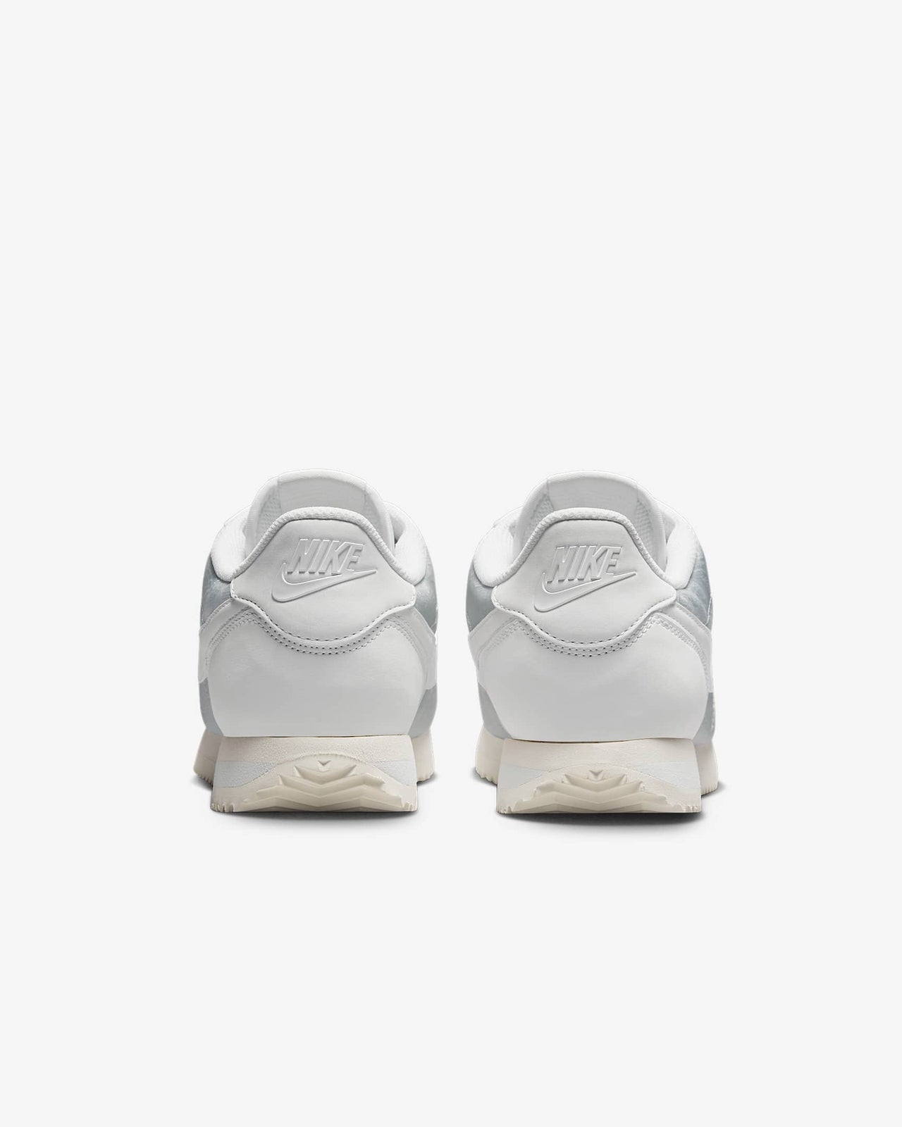 HM8286-001 Nike Cortez Platinum Tint Floral (Women's)